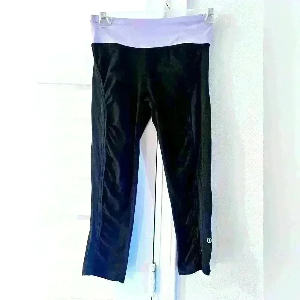 Lululemon Athletica Black Capris with Purple Waistband- Size 2- EUC
